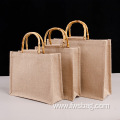 Strong inner pe coating natural hessian jute bag reusable stand-up function customize logo jute shopping bag with bamboo handle